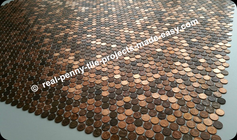 Amazing view of 12 real penny tile sheets interlocked in a dry-fit before installation.