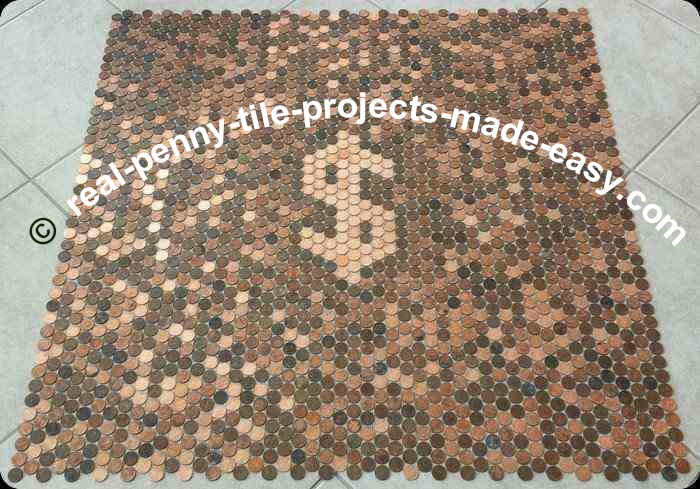 Nine tile sheets of real pennies with dollar sign made with new shiny pennies on mesh.