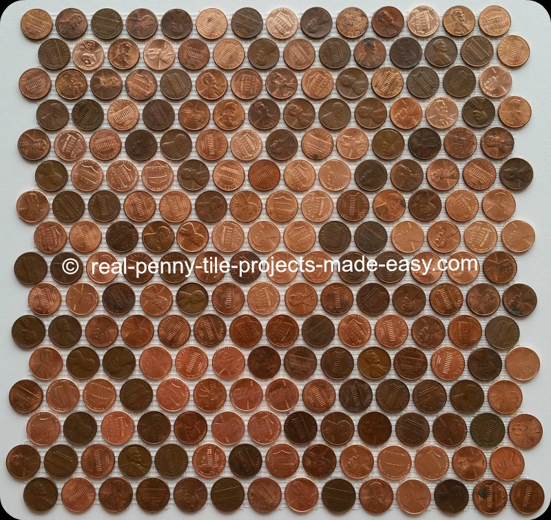 Handmade mosaic tile sheet with real (copper, zinc,..) pennies (1 cent coins as penny tile) on double mesh backing.