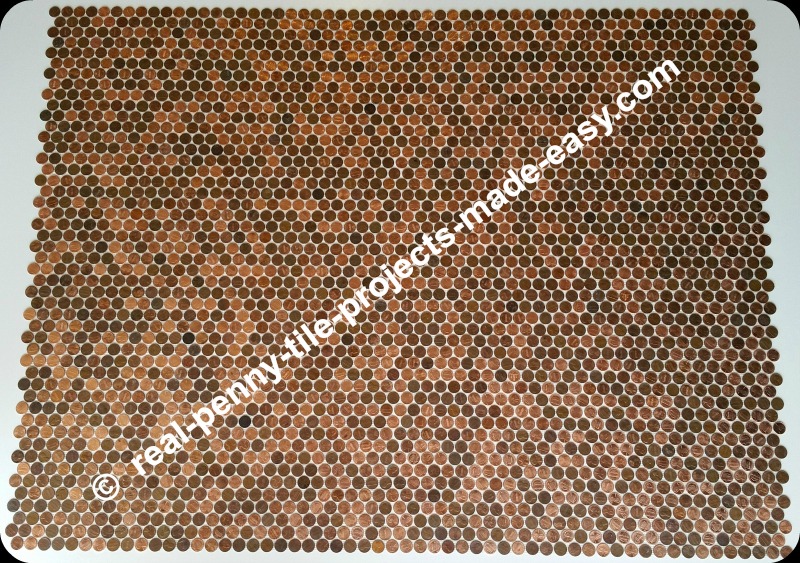 12 tile sheets of pennies perfectly interlocked.