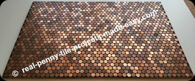 Grouted pennies as tile on sample floor.