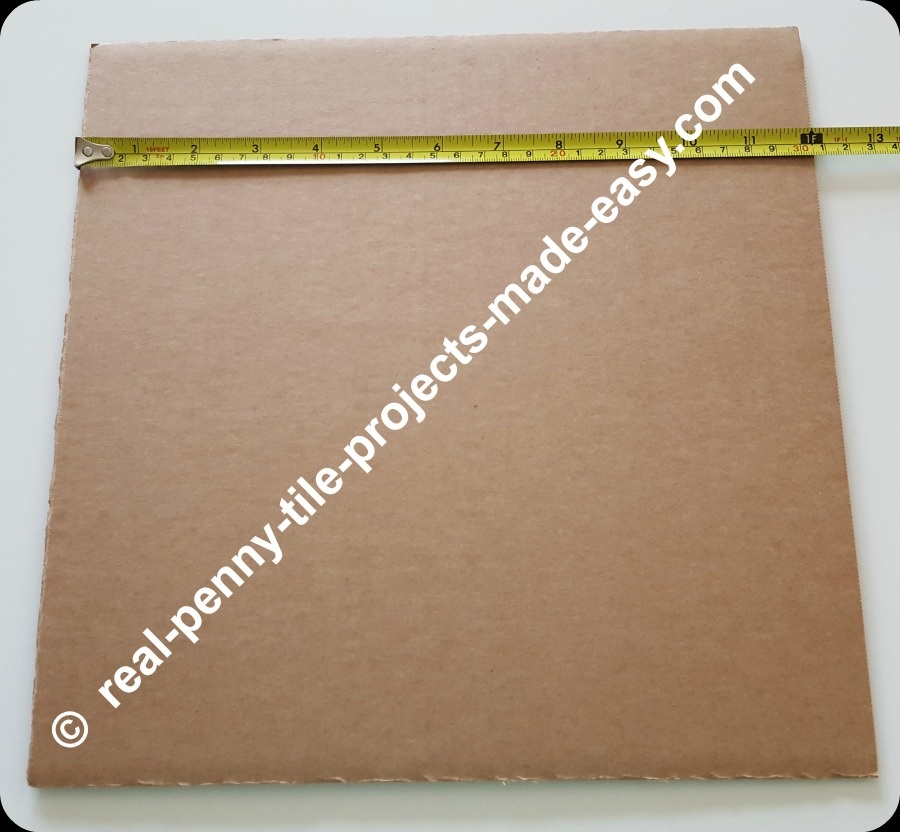 12x12 in. cardboard showing tape measure at 12 inches.